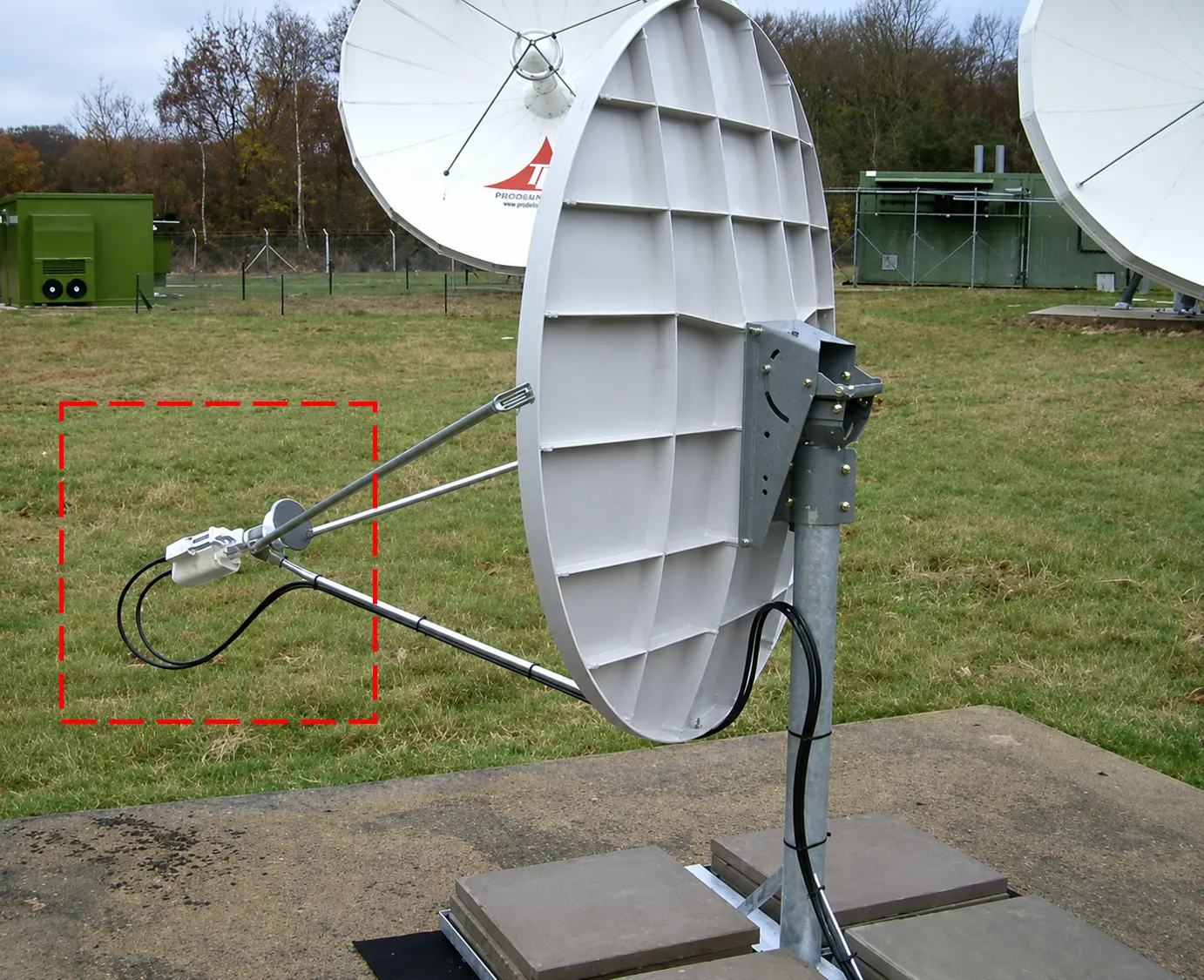 A close-up of a VSAT LNB mounted on a satellite dish
