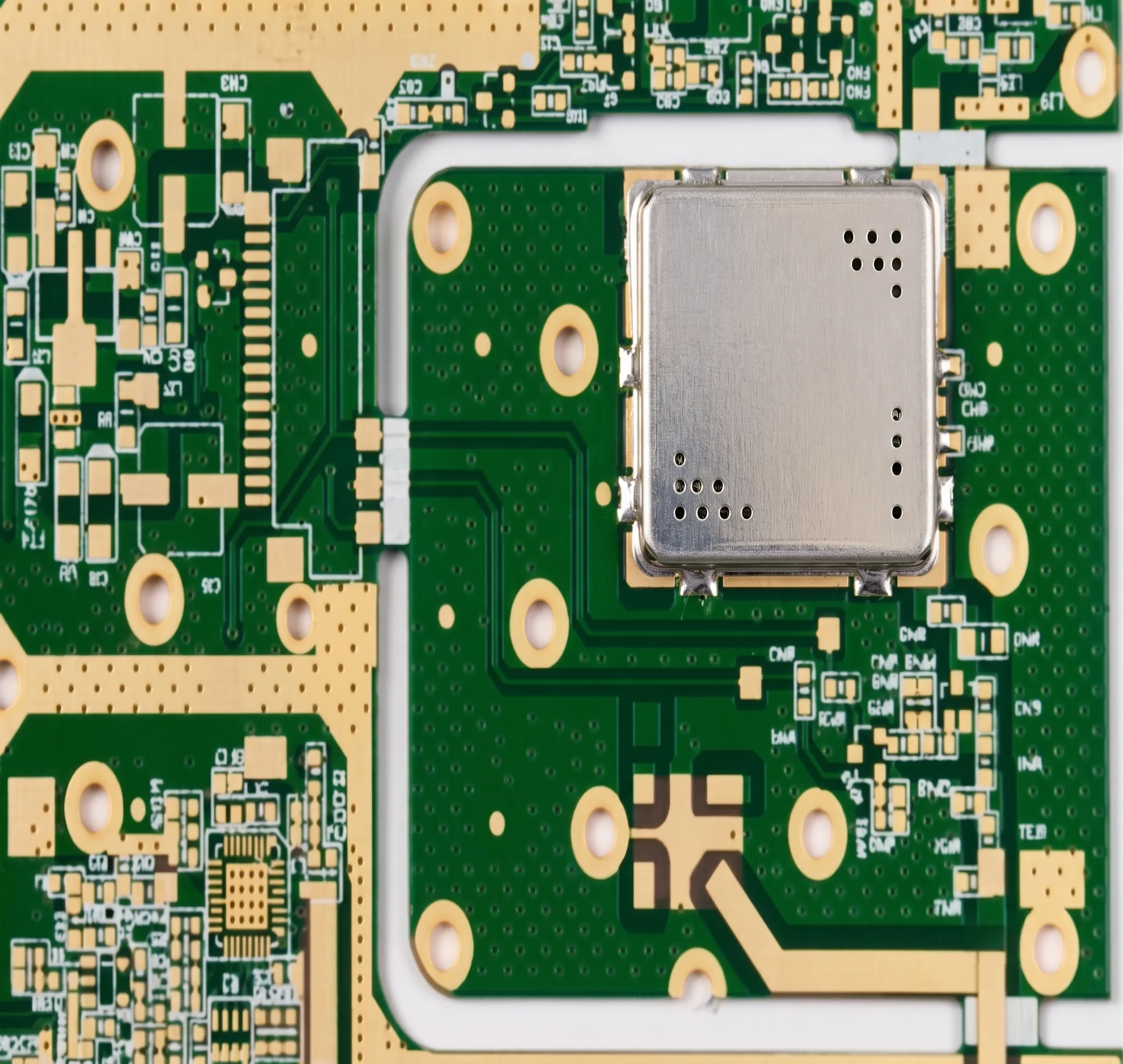 A close-up of a broadband RF up/downconverter PCB showing isolation techniques